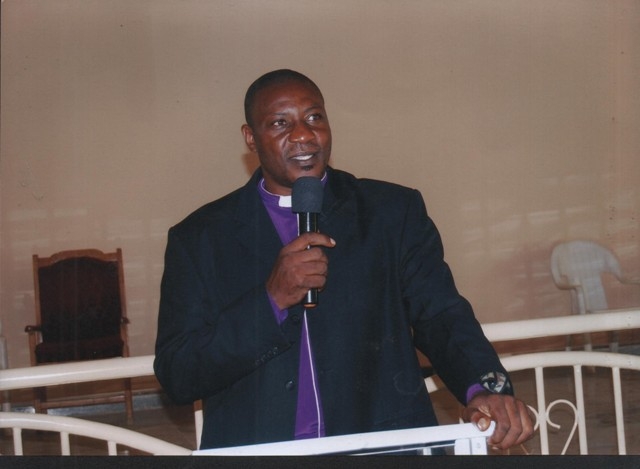http://pressreleaseheadlines.com/wp-content/Cimy_User_Extra_Fields/Dr. Raphael Happy-Ikenwilo/Dr-Raphael-Happy-speaking-at-the-Presidents-prayer-meeting.jpg